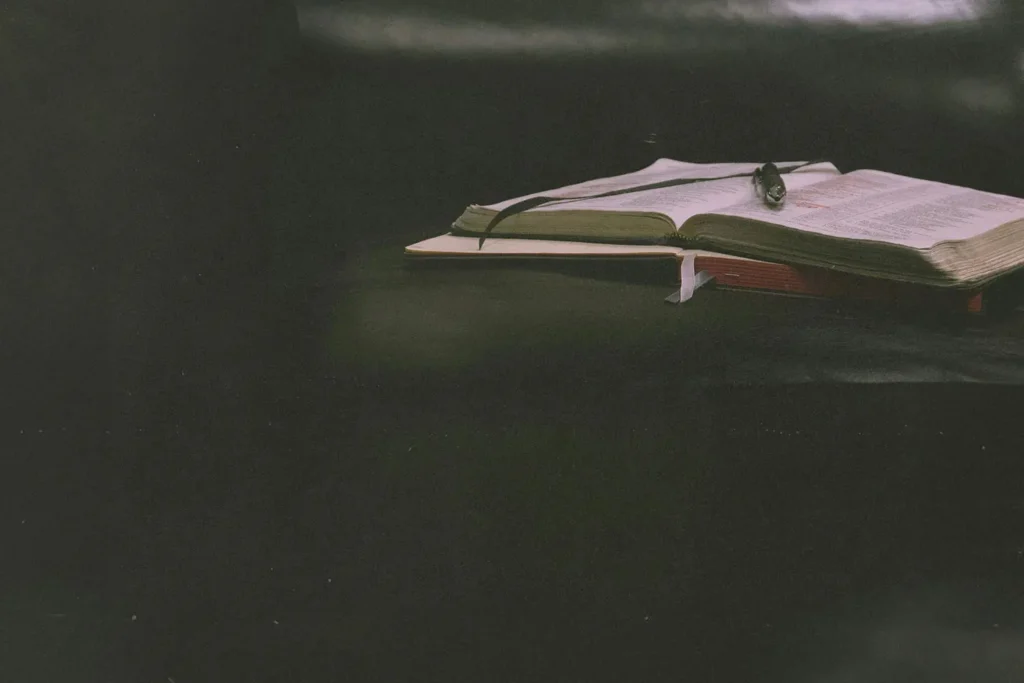 Have-You-Settled-This-KCM - KCM Blog An open Bible and notebook on a table