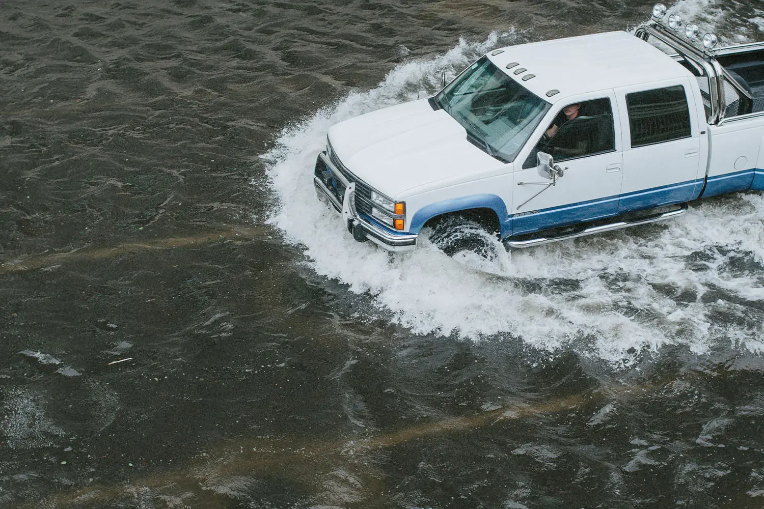 vehicle driving in high water