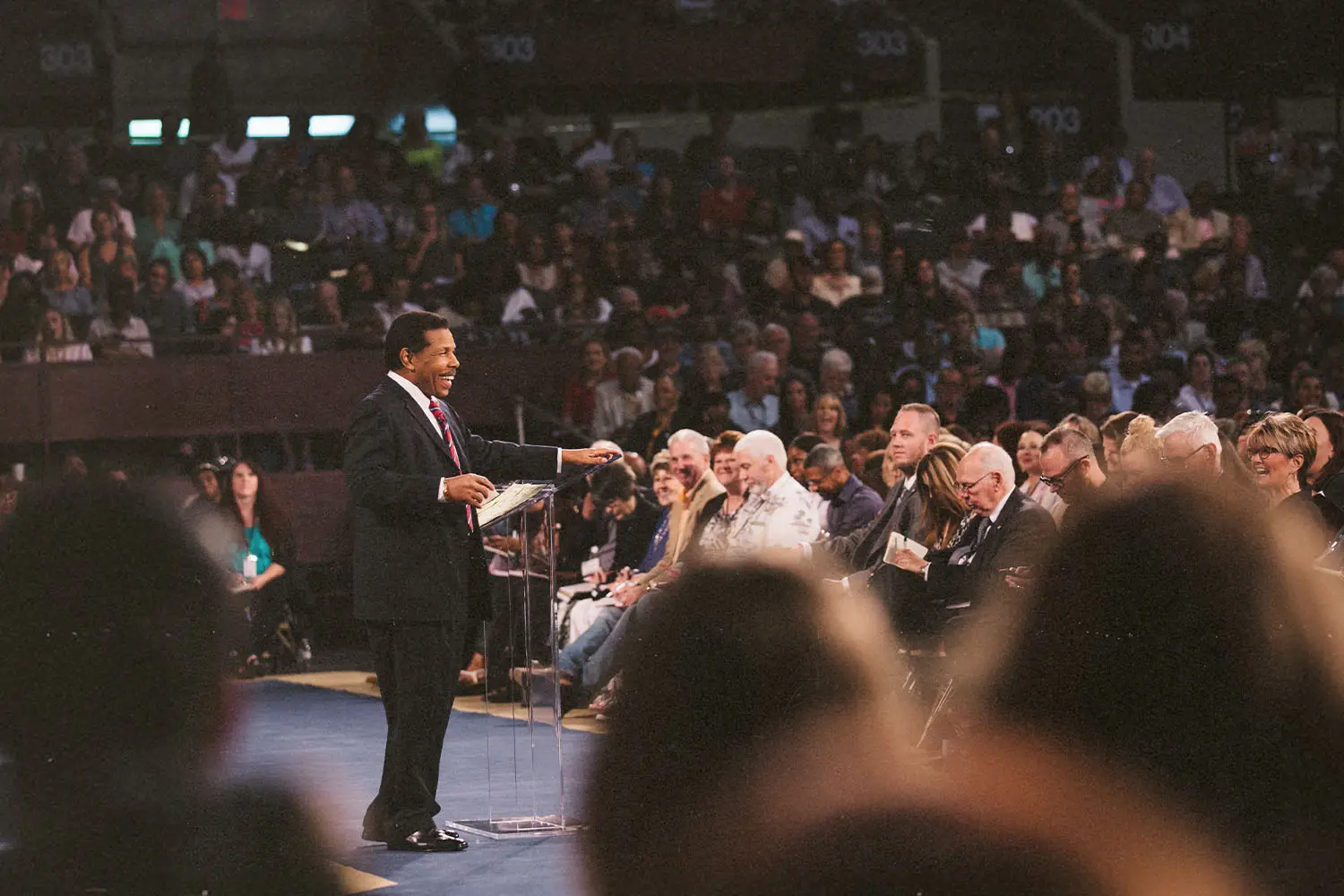 Minister speaking to an audience at Southwest Believers' Convention