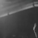 Single hand lifted in praise