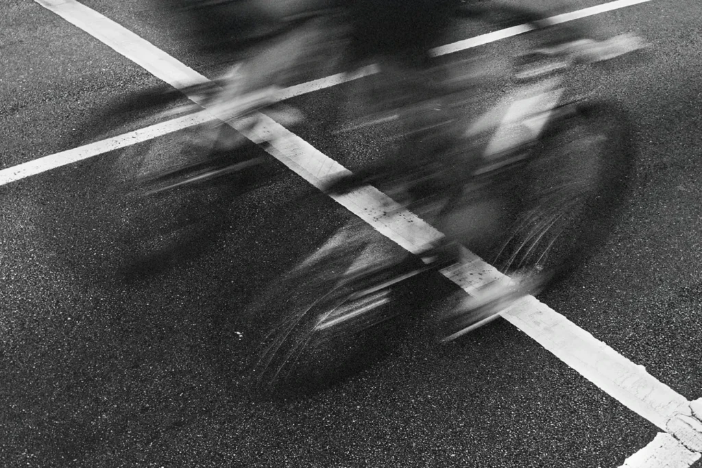 Blurry image of two bikers