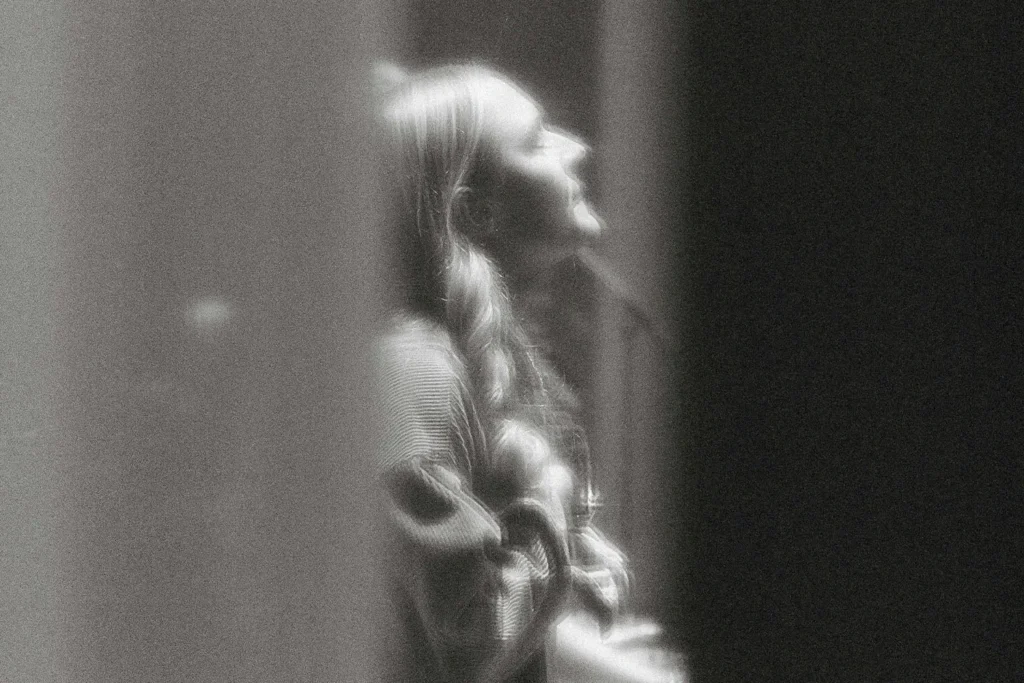 Girl lifting her head singing