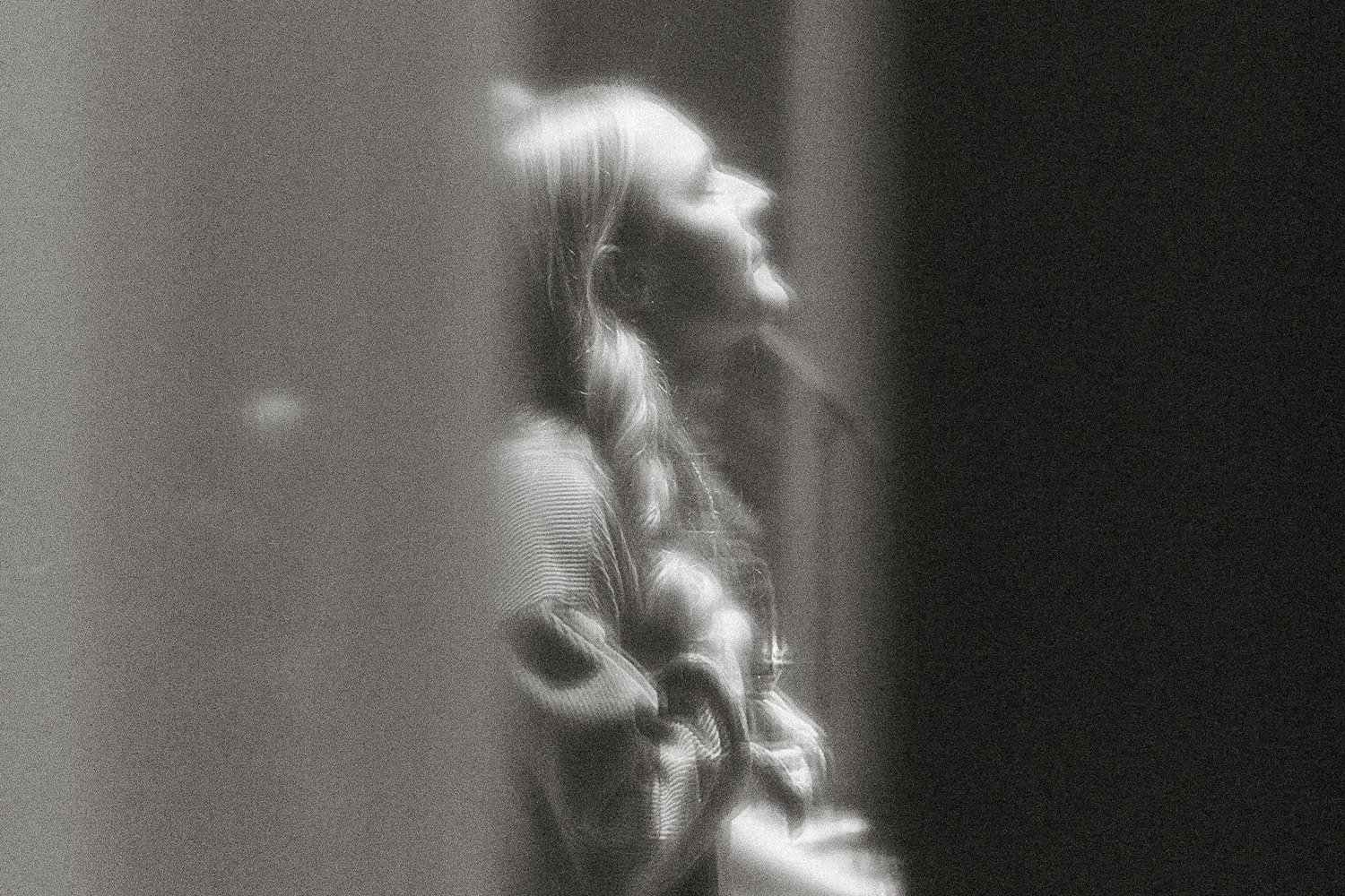 Girl lifting her head singing