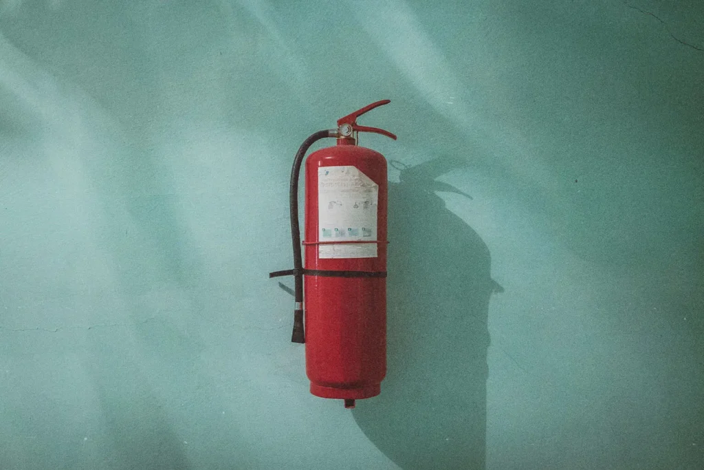 Fire extinguisher mounted on the wall