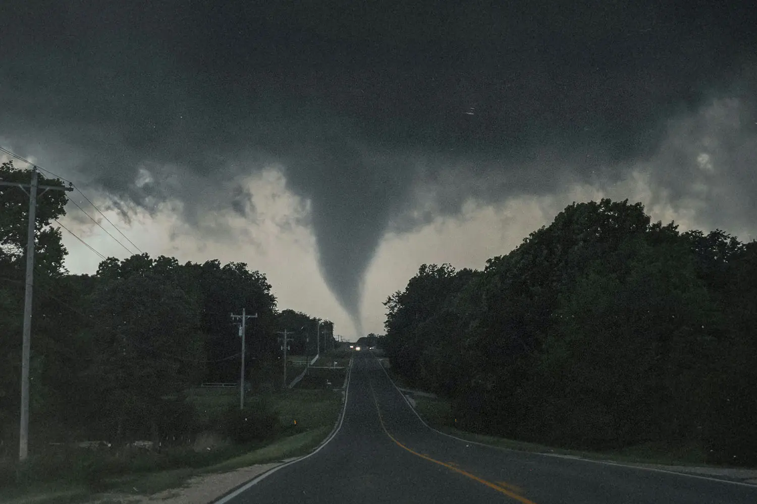 Long road leading to tornado