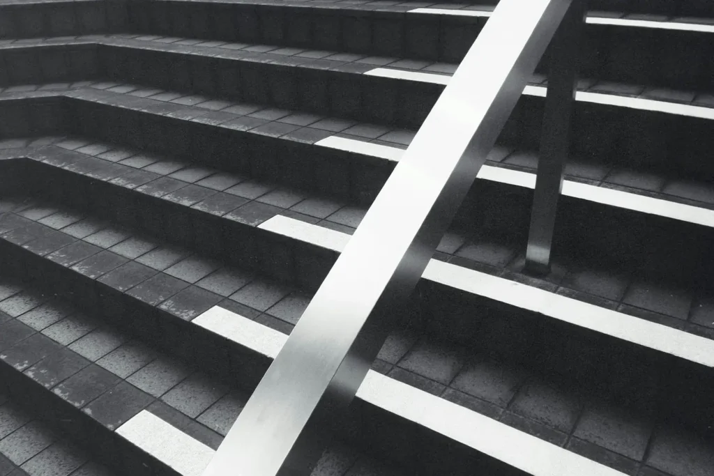 Steel rail and concrete staircase