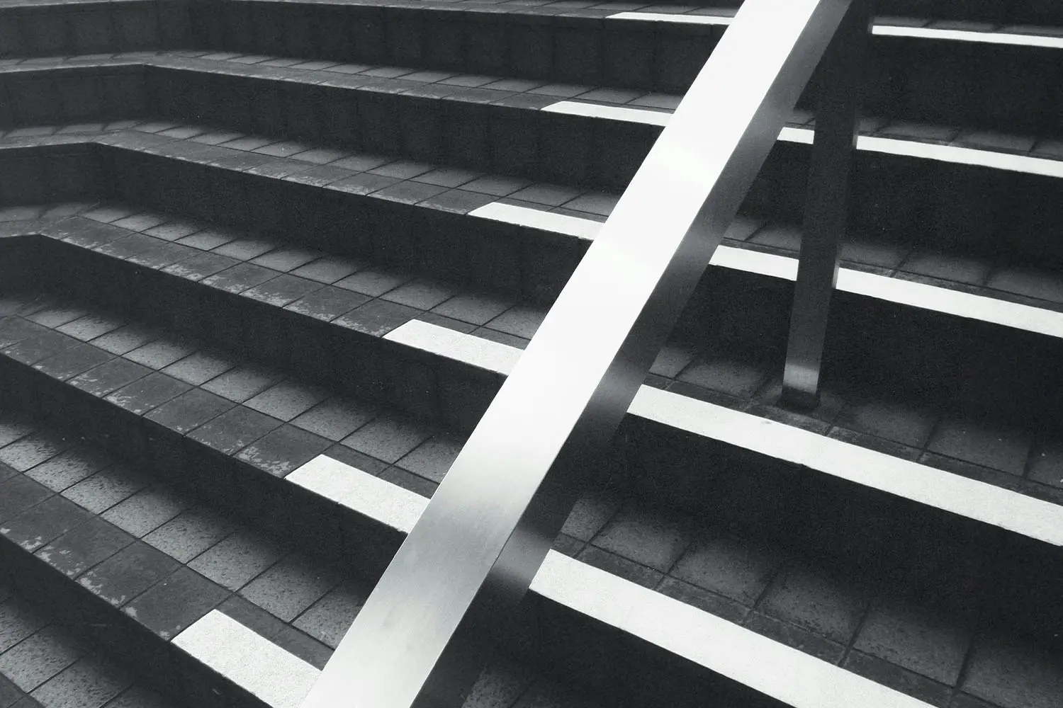 Steel rail and concrete staircase