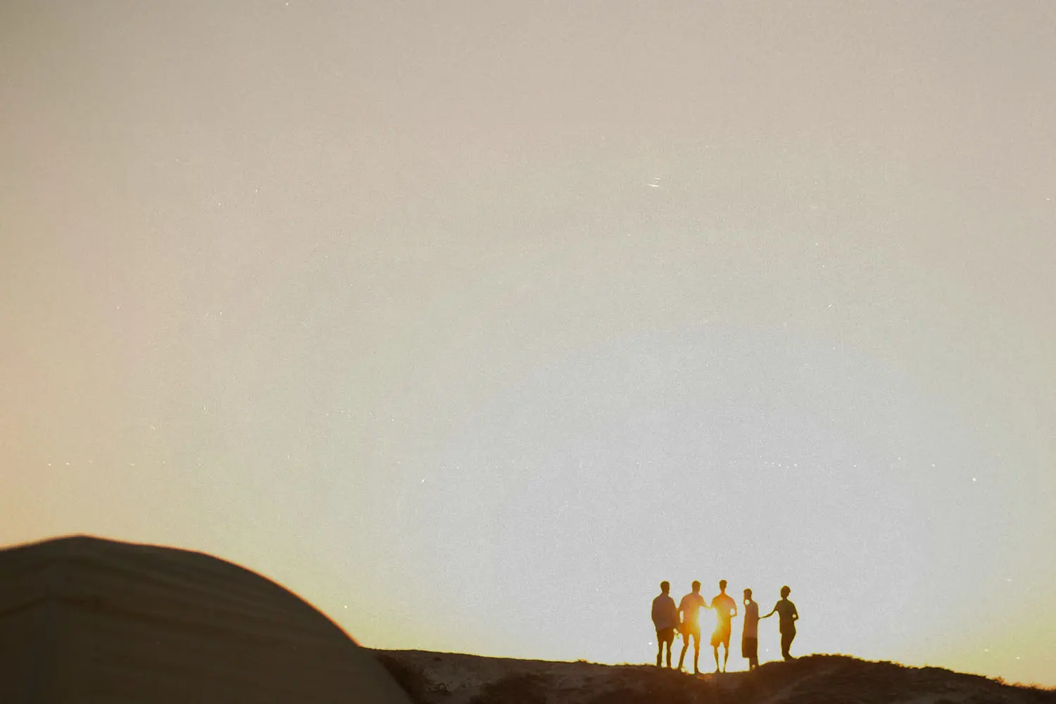 Group of friends on top of a mountain