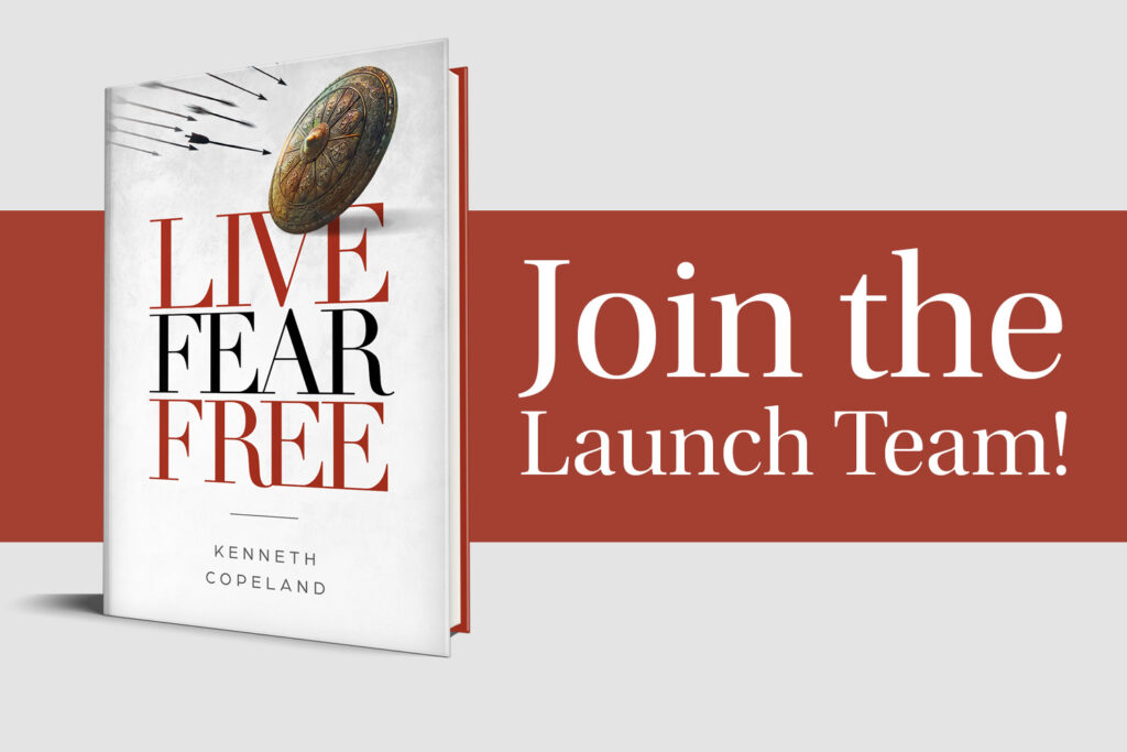 A promotional image of a white book on top of a red banner, Kenneth Copeland's new book "Live Fear Free."