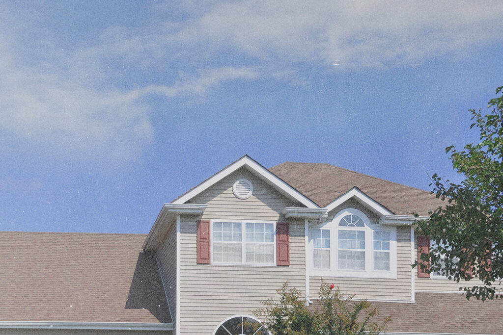 A two-story home looking to the sky