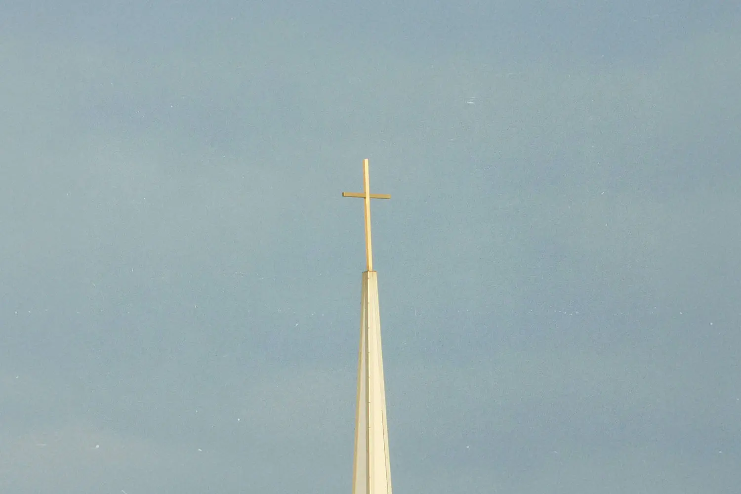 Cross on top of a steeple