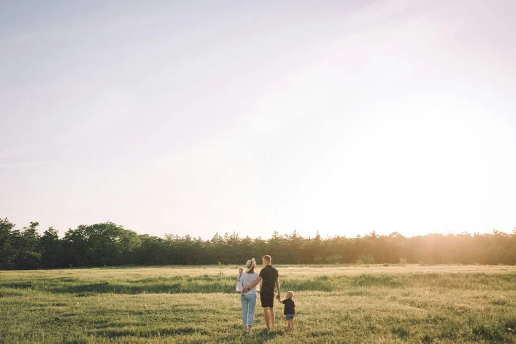 family walking in field