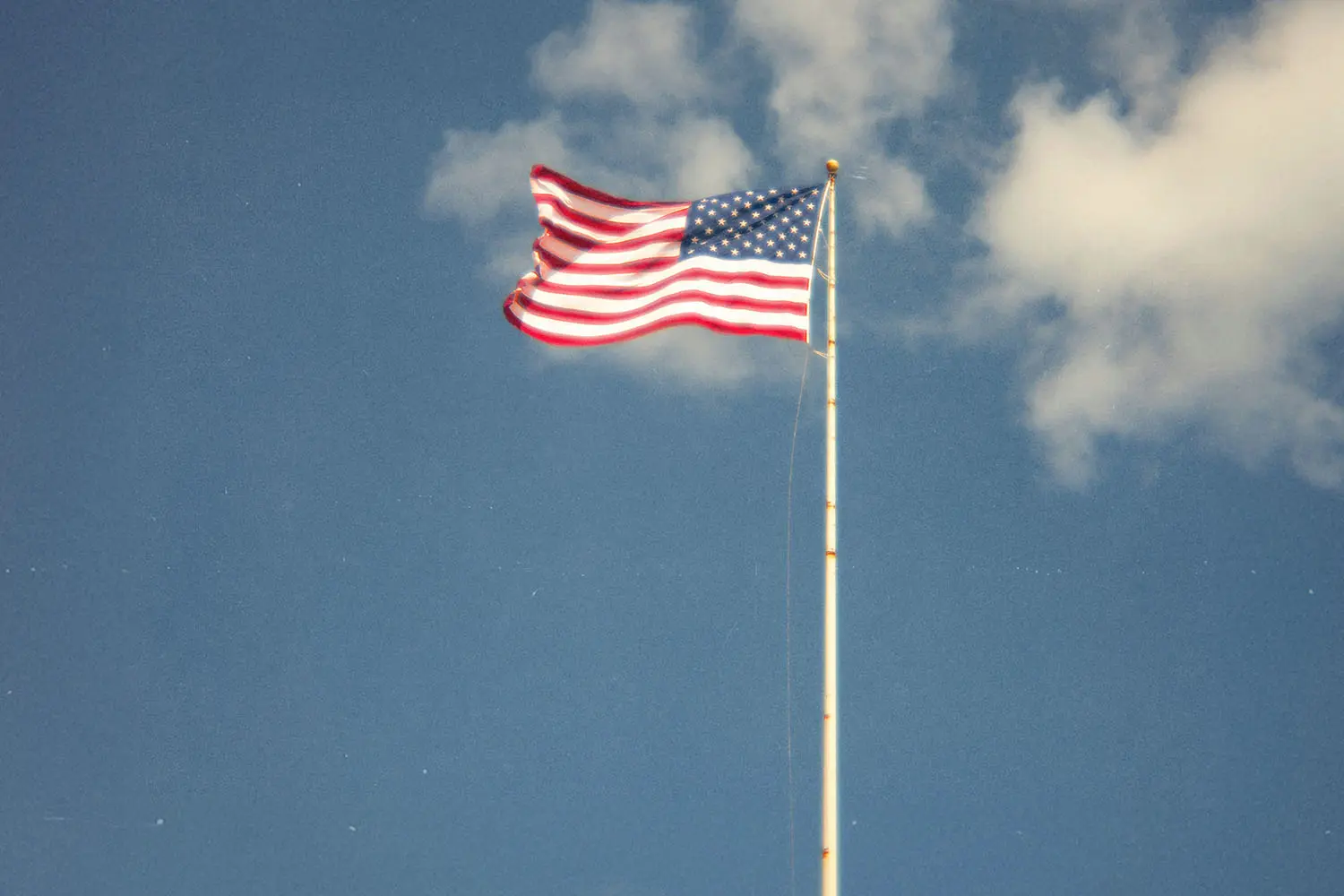 united states flag flowing in the breeze