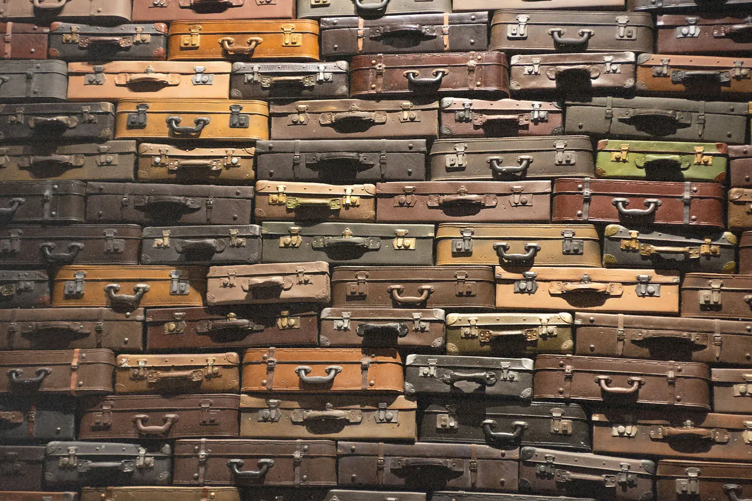 wall of metal cases with handles