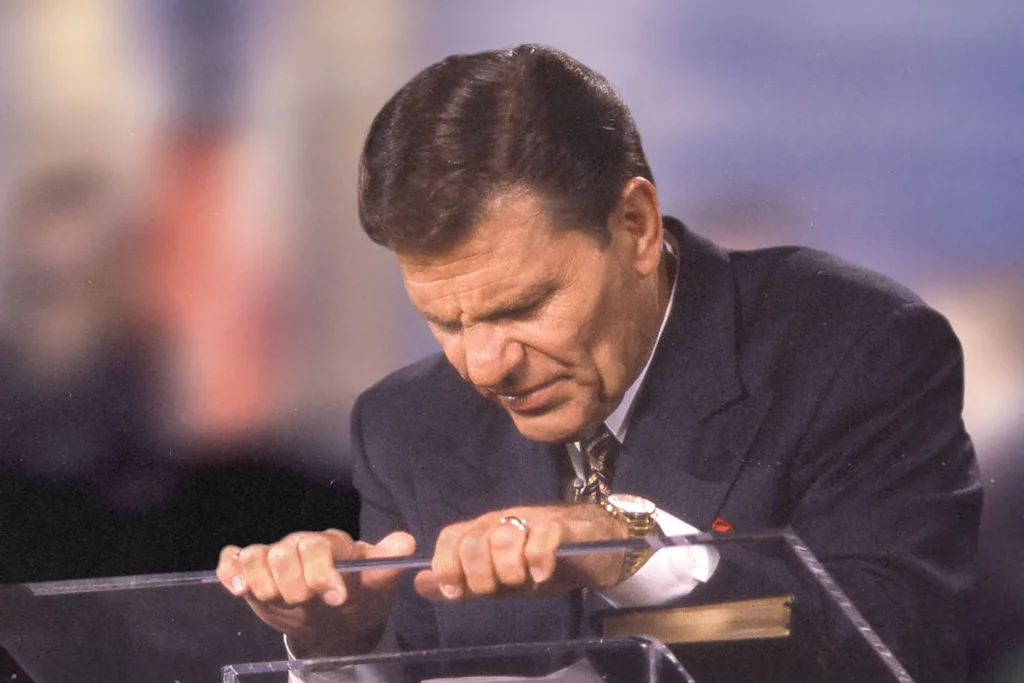 20190711-Do-You-Want-to-Walk-in-the-Same-Anointing-As-Kenne - KCM Blog Kenneth Copeland praying at a podium