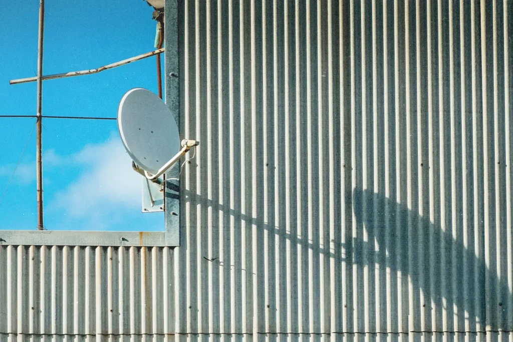 20190724-News-Flash-BVOVN-Is-Becoming-VICTORY-Channel-KCM-B - KCM Blog satellite dish on the side of a metal building