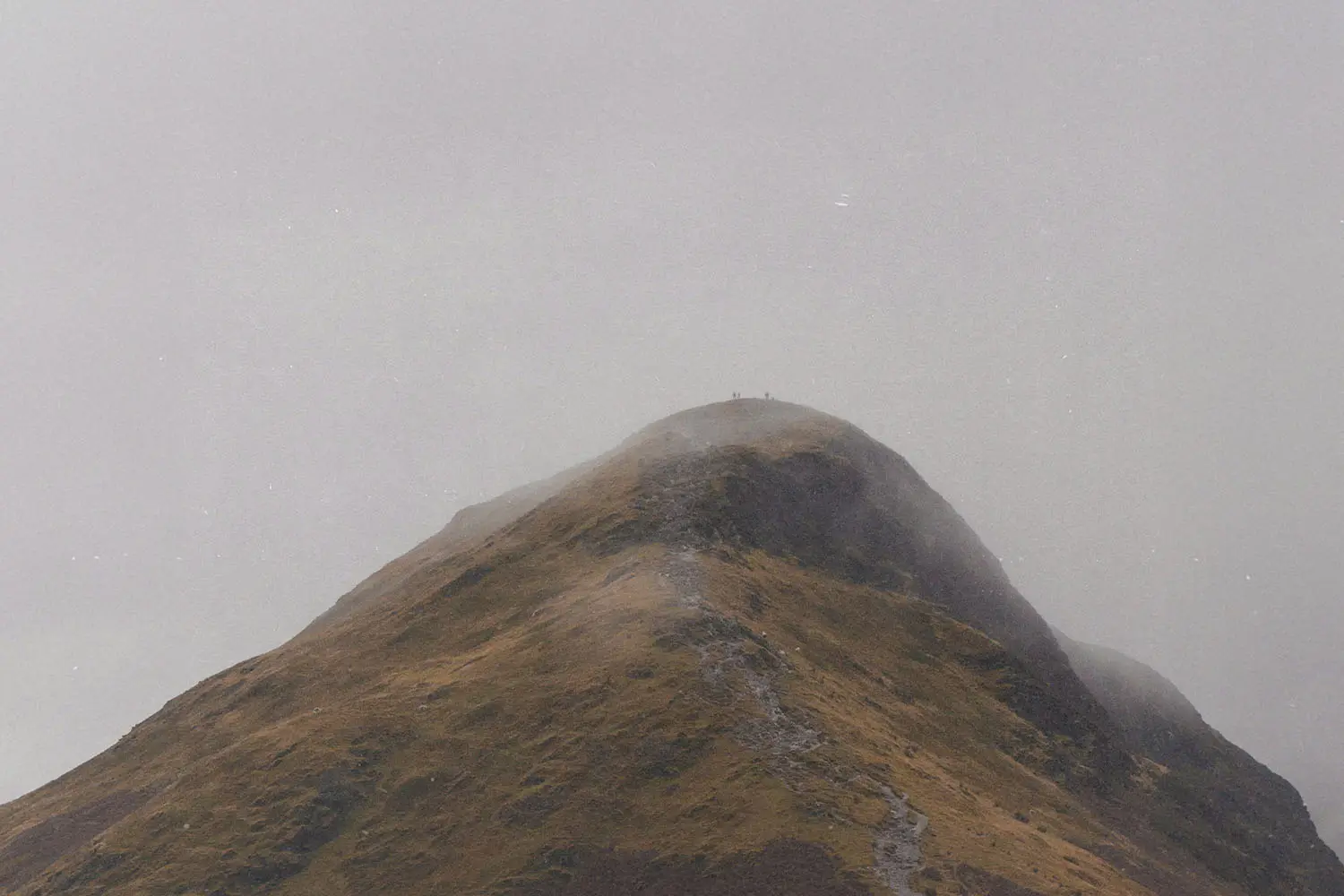 Fog over top of a mountain