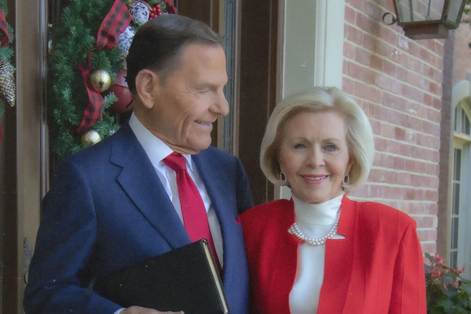 Kenneth Copeland looking at Gloria Copeland smiling