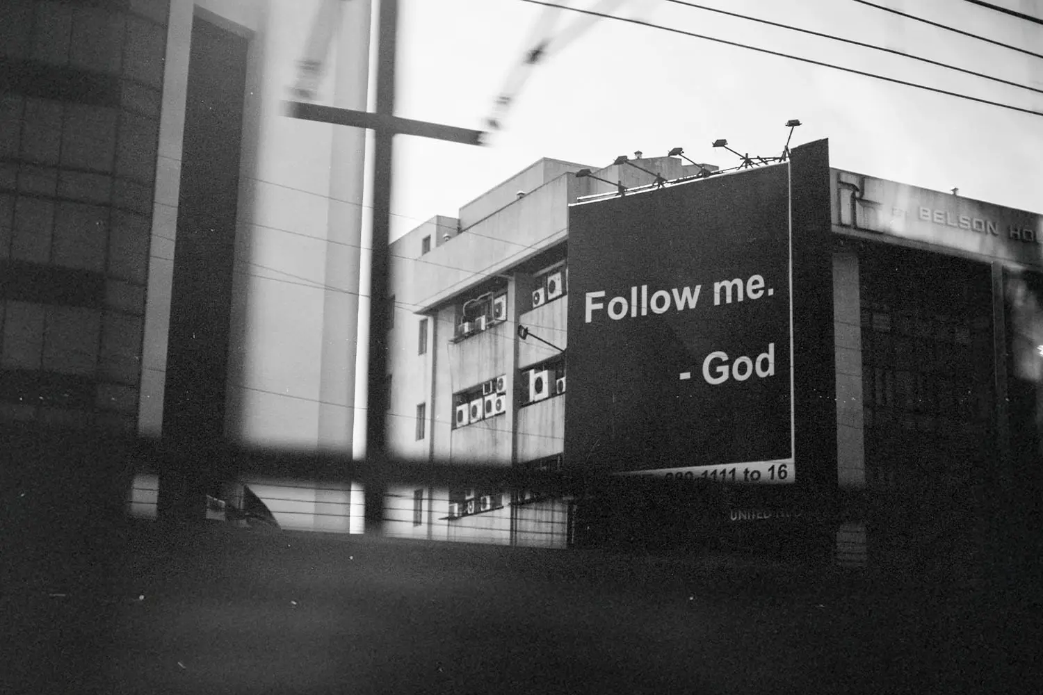 Sign that says "Follow Me. - God"
