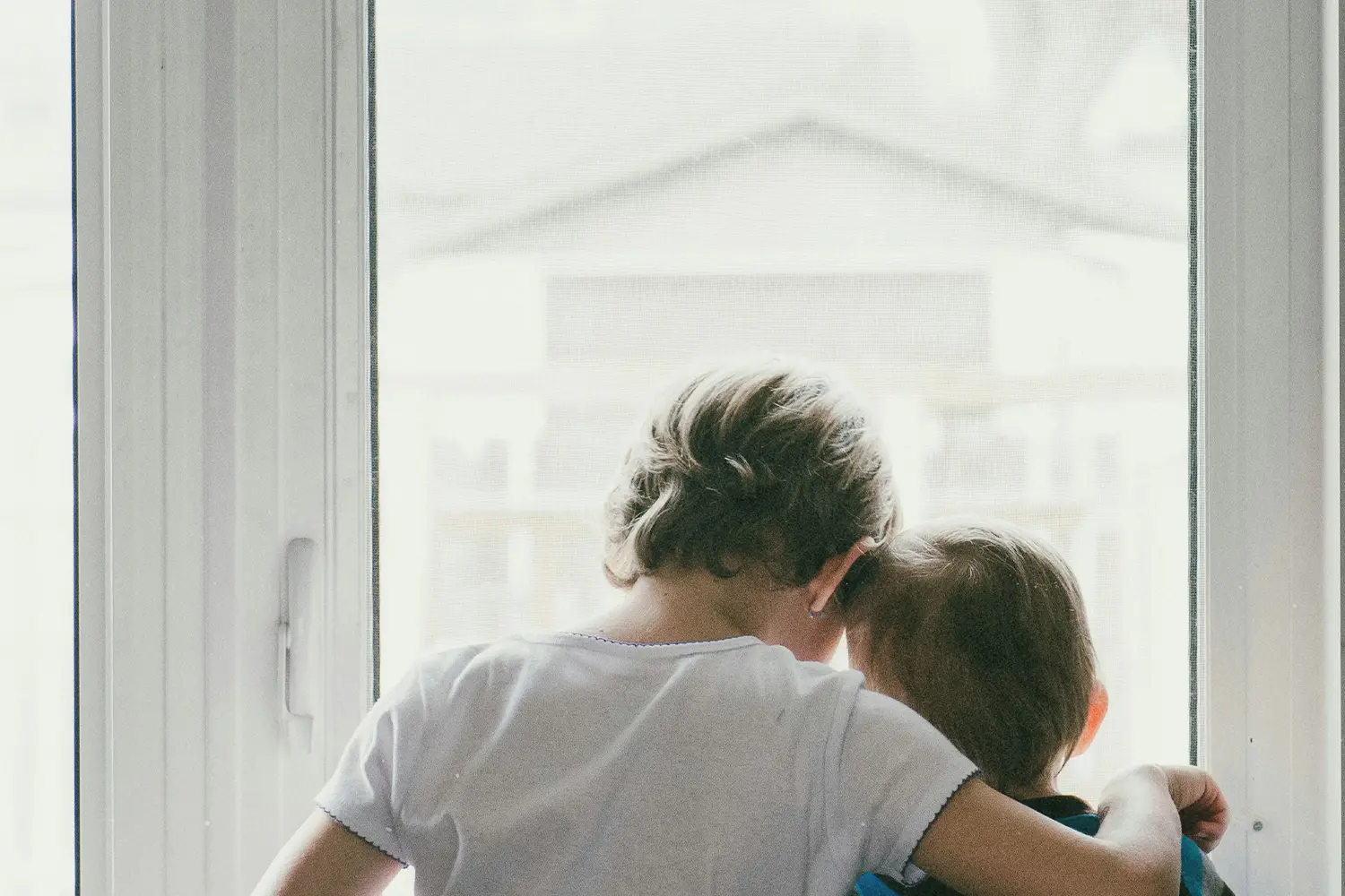 couple embracing in the doorway