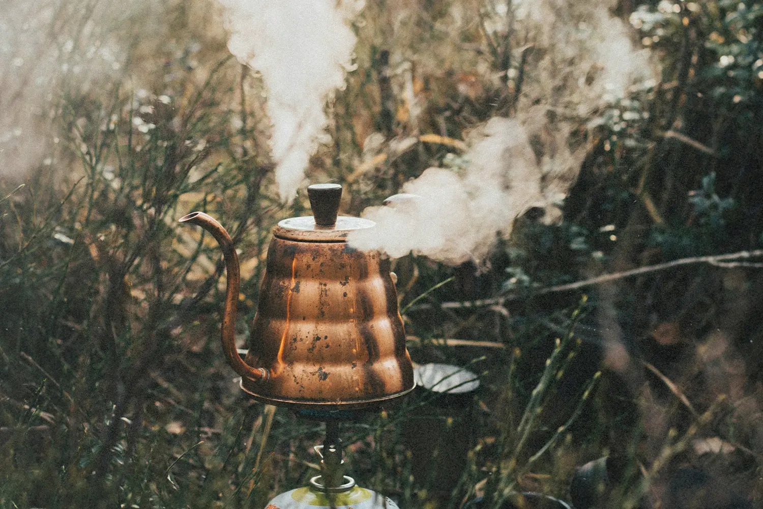 Copper kettle with steam coming out