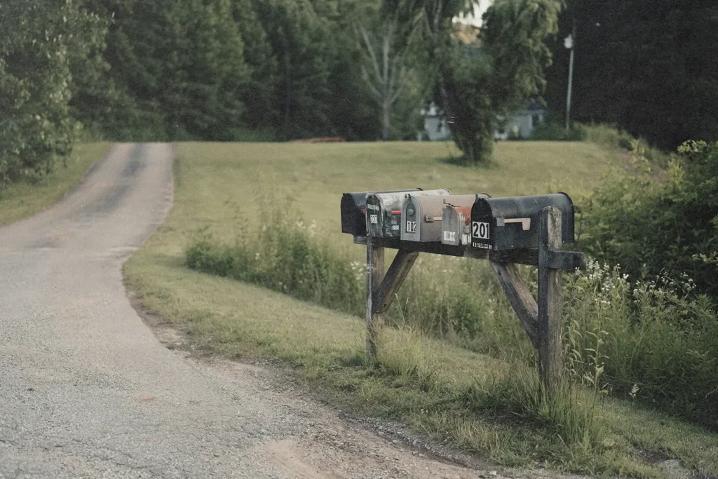 row of mailboxes on a rural road