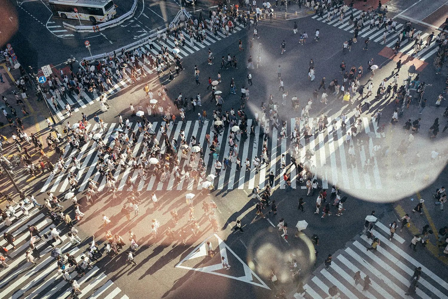 intersection full of crowds of people