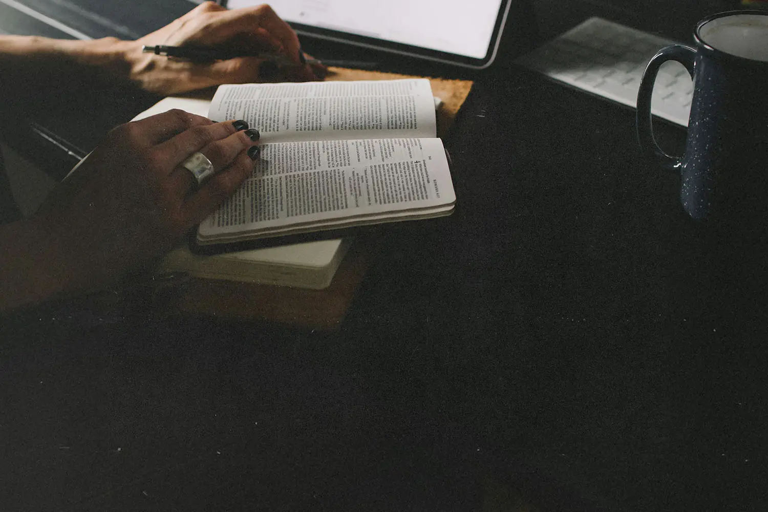 hands on open bible, reading