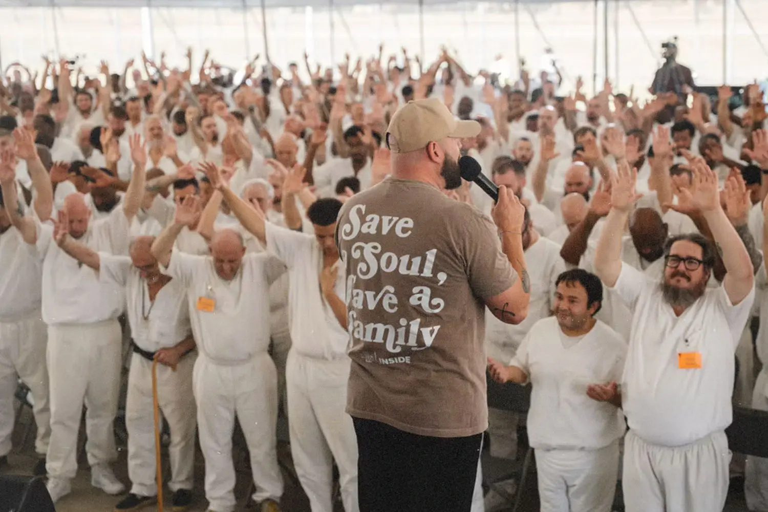 Mike Barber preaching to a crowd of prison inmates