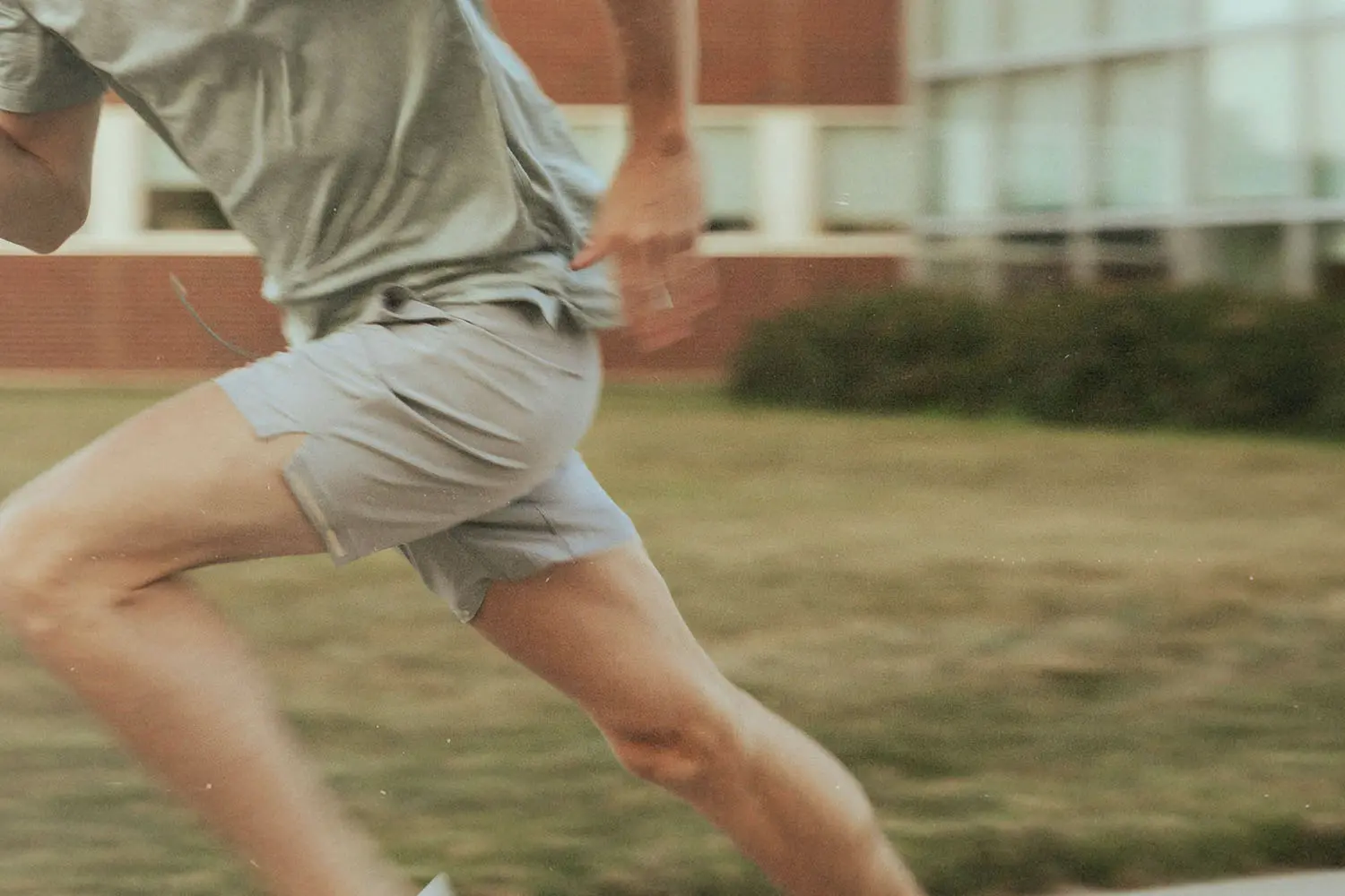 Person running on the sidewalk